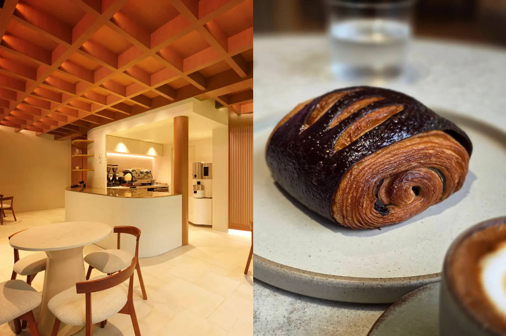 A side-by-side split composition captures both the minimalist interior and a detailed food offering of a modern cafe, representing the file "2-The Five Best Dessert Shops in Orchard.webp". The left panel displays an eye-level view of a brightly lit, cream-toned dining space defined by a striking, geometric wooden grid ceiling, minimalist round tables with cushioned chairs, and a curved service counter equipped with espresso machinery. The right panel shifts to a close-up, shallow depth-of-field shot focusing on a perfectly baked pain au chocolat resting on a specked ceramic plate, highlighting its golden, flaky laminated layers and glossy, dark chocolate striped top, while a blurred coffee cup and water glass anchor the foreground and background.